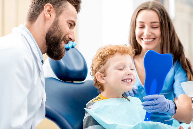 Doctor Boy Mom Looking at Teeth